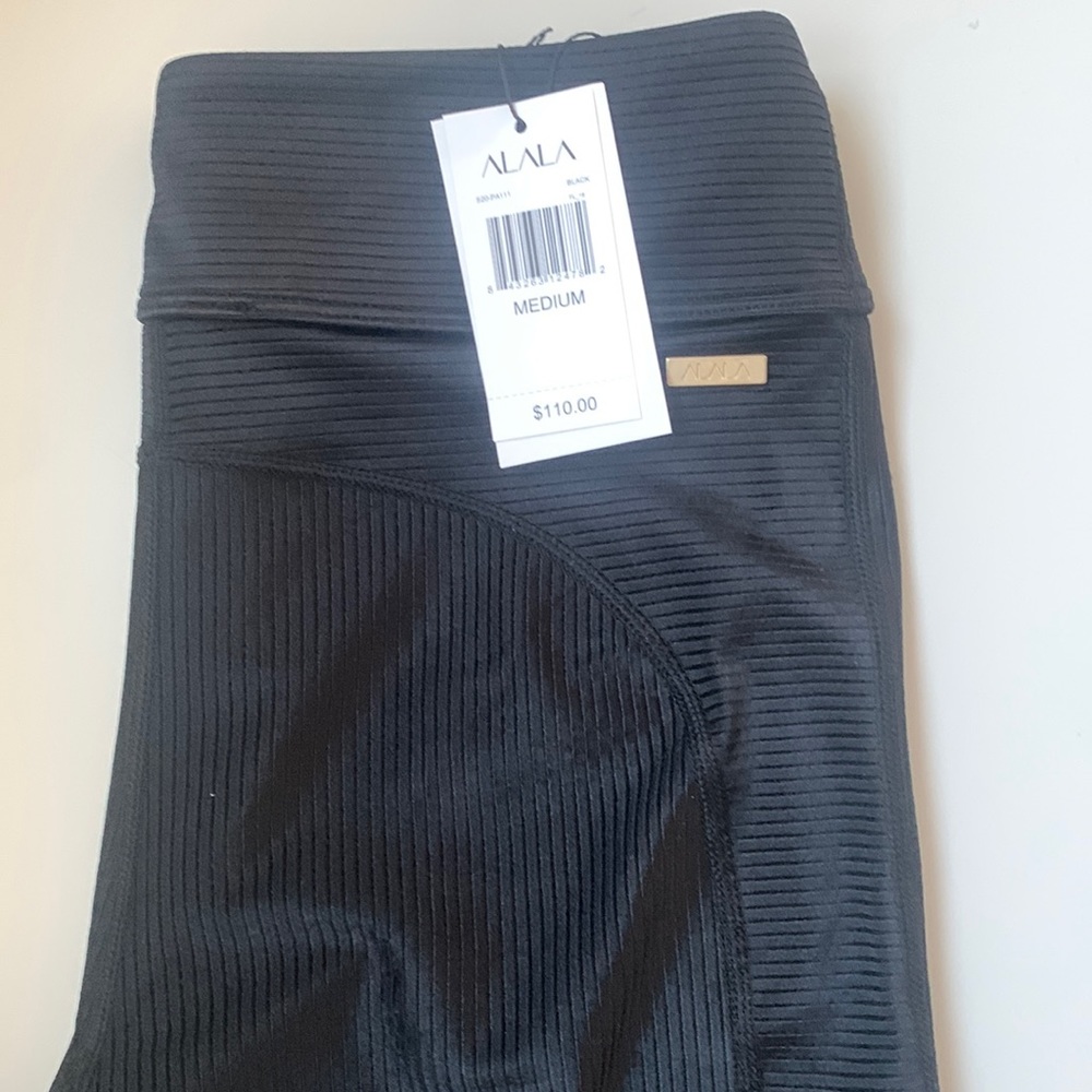 Brand new Alala shiny ribbed leggings